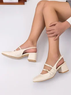 Pumps met bandje crème