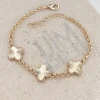 Vergulde armband met sierelementen